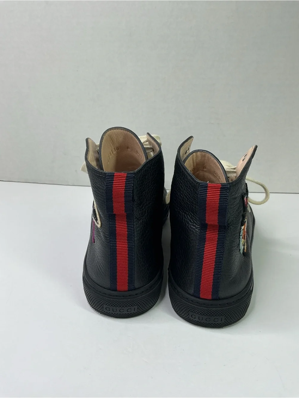 Gucci black leather high-top sneakers
